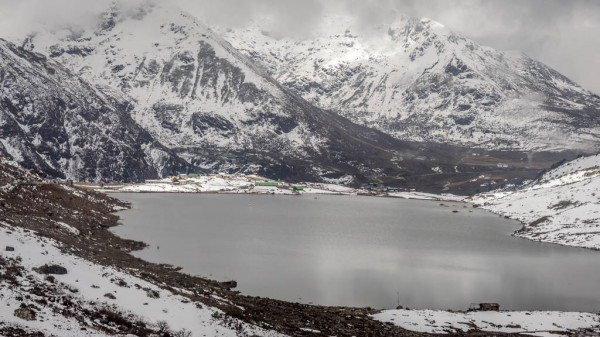 depositphotos 232776836 stock photo sarathang lake surrounded snow covered
